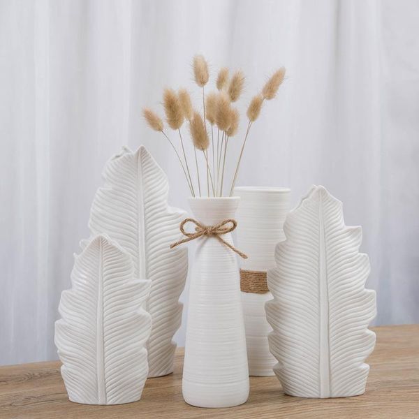 vases simple modern ceramic white vase decoration flower insert with rope bow table living room home
vases simple modern ceramic white vase decoration flower insert with rope bow table living room home