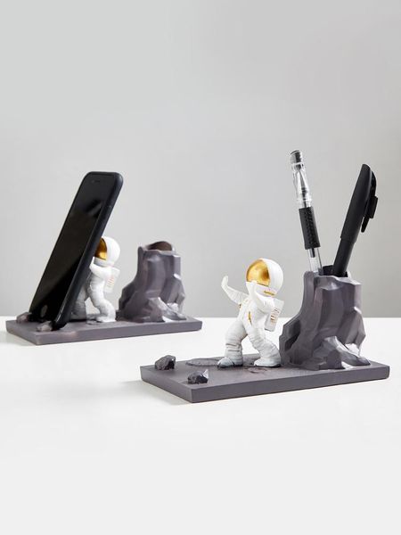 creative astronaut mobile phone stand, flat deskpen holder, office tea table ornament cell mounts & holders
creative astronaut mobile phone stand, flat deskpen holder, office tea table ornament cell mounts & holders