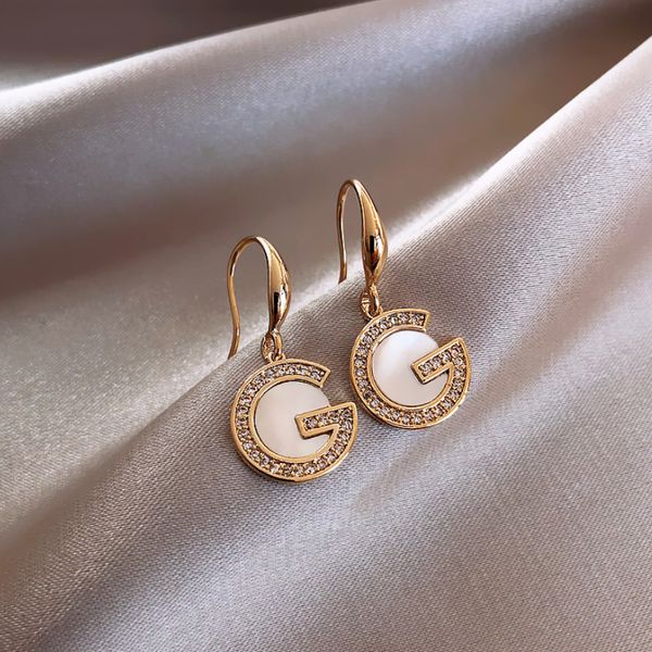 design jewelry new han dong gate personalized letter diamond earrings women's fashion temperament ear hook net red hundred earrings, Silver
design jewelry new han dong gate personalized letter diamond earrings women's fashion temperament ear hook net red hundred earrings, Silver