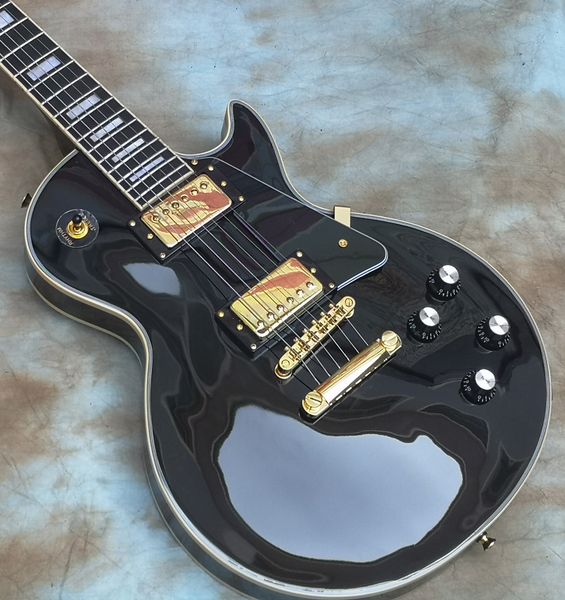 electric guitar black custom,70s, ebony fingerboard, binding over frets