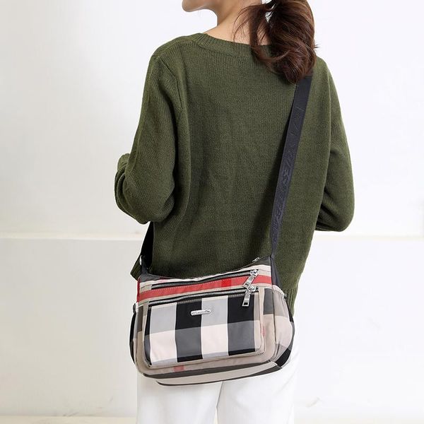 totes 2021 casual women's shoulder bag nylon waterproof plaid crossbody soft zip multi pocket versatile purses and handbags sac
totes 2021 casual women's shoulder bag nylon waterproof plaid crossbody soft zip multi pocket versatile purses and handbags sac