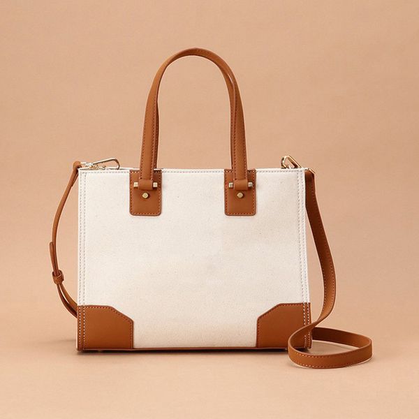 design handbag 2021 summer new korean canvas with leather women's leisure fashion shopping bag single shoulder handbag, Red;black
design handbag 2021 summer new korean canvas with leather women's leisure fashion shopping bag single shoulder handbag, Red;black