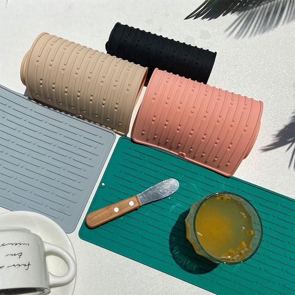 kitchen drain pad silica gel meal dinner plate large filter cutting board anti slip scald pot household coaster
kitchen drain pad silica gel meal dinner plate large filter cutting board anti slip scald pot household coaster