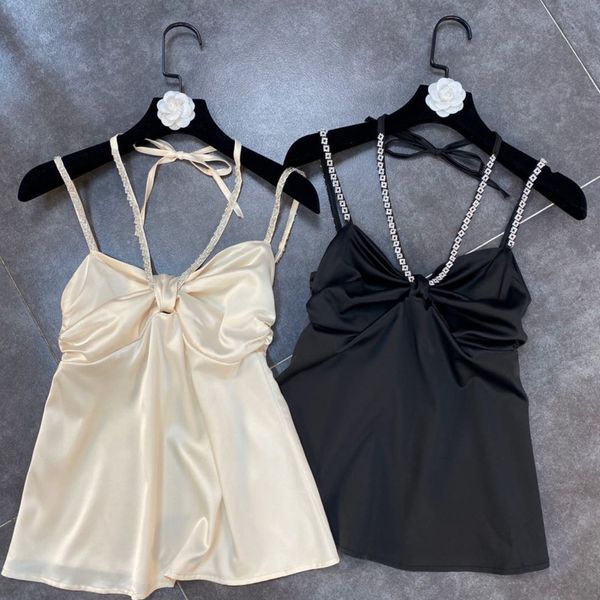 spring arrivals solid color diamond neck strap shoulder button and bow style vest mz327 210525, White
spring arrivals solid color diamond neck strap shoulder button and bow style vest mz327 210525, White