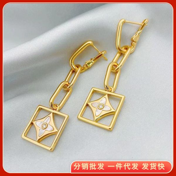 charms high sense square pendant clover white fritillaria diamond inlaid long gold chain french earrings, Golden
charms high sense square pendant clover white fritillaria diamond inlaid long gold chain french earrings, Golden