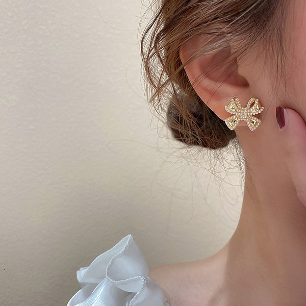 925 silver needle pearl bow earrings temperament fairy fashion earrings french personality small earrings girl
925 silver needle pearl bow earrings temperament fairy fashion earrings french personality small earrings girl