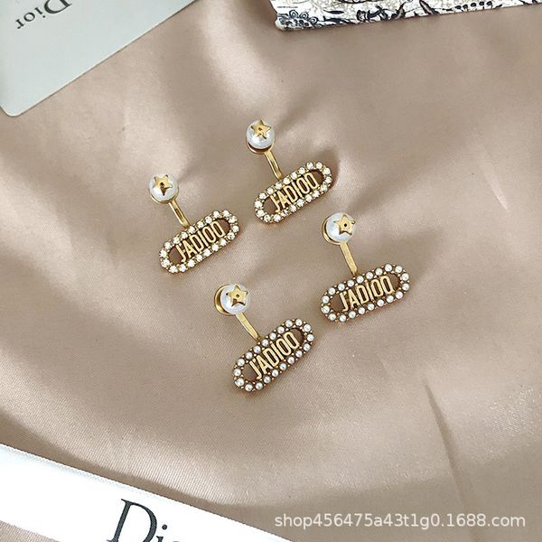new d family female letters pearl rhine-stone five pointed star earrings fashion versatile anti allergy 925, Golden
new d family female letters pearl rhine-stone five pointed star earrings fashion versatile anti allergy 925, Golden