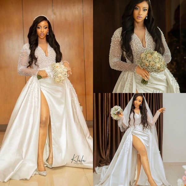plus size pearls mermaid 2022 wedding dresses bridal gowns with detachable train beaded v neck long sleeve side split arabic country garden, White
plus size pearls mermaid 2022 wedding dresses bridal gowns with detachable train beaded v neck long sleeve side split arabic country garden, White