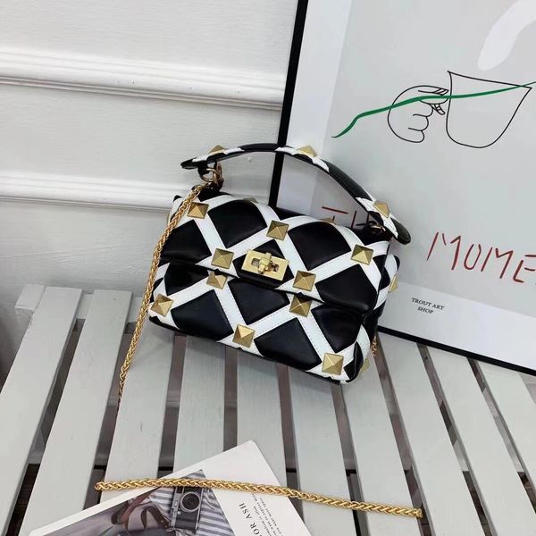 021 fashion small fragrance big rivet color matching chain bag super fire messenger shoulder women's summer luxuryss designerss yw
021 fashion small fragrance big rivet color matching chain bag super fire messenger shoulder women's summer luxuryss designerss yw
