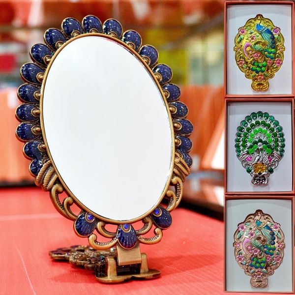 europe large size oval fold hand mirror peacock decoration metal portable home makeup beauty for gifts j055 mirrors
europe large size oval fold hand mirror peacock decoration metal portable home makeup beauty for gifts j055 mirrors
