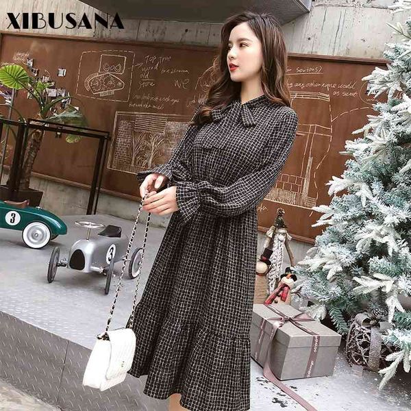 vintage plaid dress women bow tie collar long sleeve dresses casual vestidos mujer flare sleeve mid calf dresses 210423, Black;gray
vintage plaid dress women bow tie collar long sleeve dresses casual vestidos mujer flare sleeve mid calf dresses 210423, Black;gray