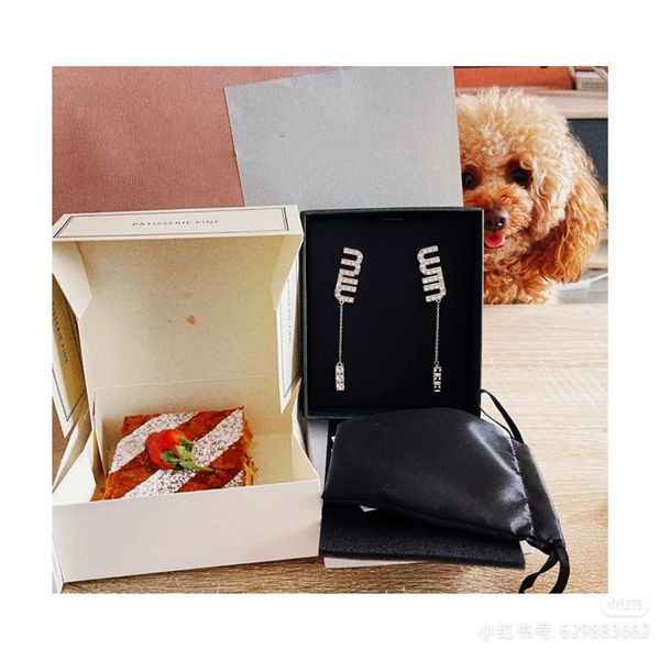 earrings cuff stud korean net red same miu letter inlaid with zircon fashion exaggerated long, Golden
earrings cuff stud korean net red same miu letter inlaid with zircon fashion exaggerated long, Golden