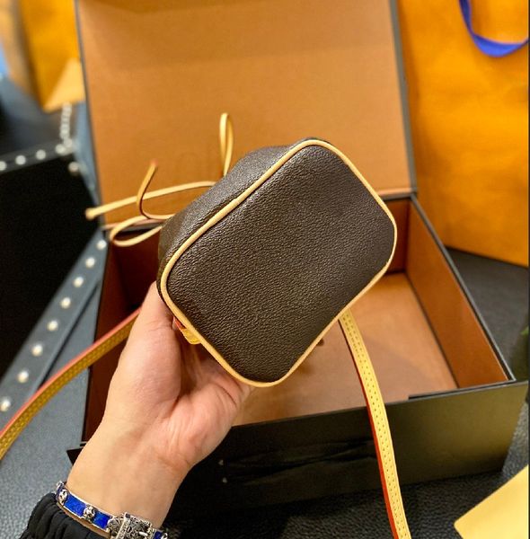 mini bucket bag fashion designer style with letter key chain pendant women's straddle shoulder bags wallet
mini bucket bag fashion designer style with letter key chain pendant women's straddle shoulder bags wallet