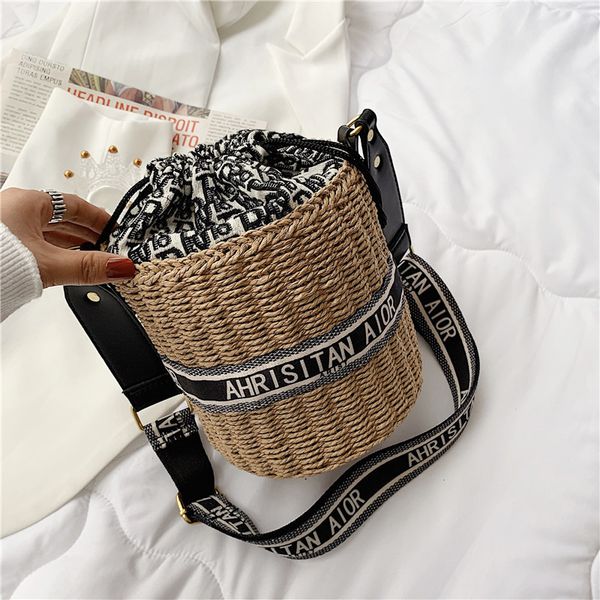 straw bag female summer new fashion portable bucket woven silk scarf messenger handbags premium
straw bag female summer new fashion portable bucket woven silk scarf messenger handbags premium