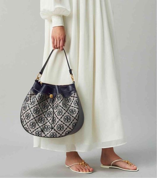 tb new half moon tote cowhide with canvas embroidered denim portable messenger bag high quality
tb new half moon tote cowhide with canvas embroidered denim portable messenger bag high quality