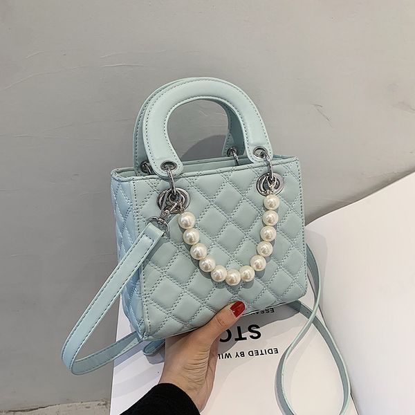 design 2021 summer new fashion simple women's one shoulder portable princess of wales solid color temperament pearl messenger bag
design 2021 summer new fashion simple women's one shoulder portable princess of wales solid color temperament pearl messenger bag