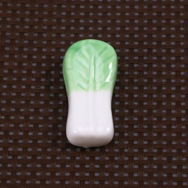 chopsticks lovely ceramic vegetables rest japanese style pillow rack spoon fork holder (chinese cabbage)
chopsticks lovely ceramic vegetables rest japanese style pillow rack spoon fork holder (chinese cabbage)