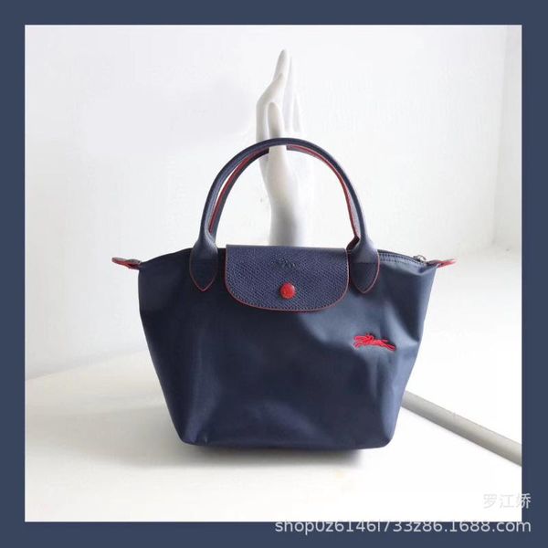 women's mini handbag nylon canvas bag embroidered horse dumplings short handle small hand-held stiletto duffel bags
women's mini handbag nylon canvas bag embroidered horse dumplings short handle small hand-held stiletto duffel bags