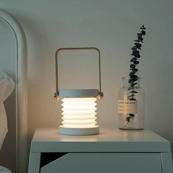 portable lanterns lantern lamp with wooden handle multifunctional foldable small table ac889
portable lanterns lantern lamp with wooden handle multifunctional foldable small table ac889