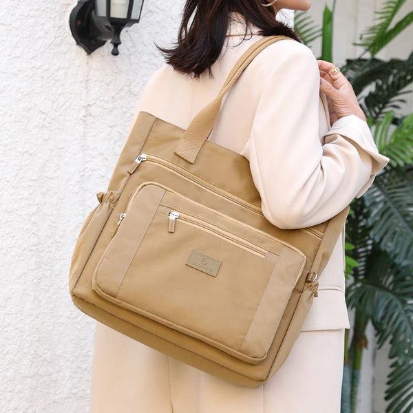 school bags 2021 fashion messenger bag women shoulder nylon handbag large capacity women's tote shopping
school bags 2021 fashion messenger bag women shoulder nylon handbag large capacity women's tote shopping