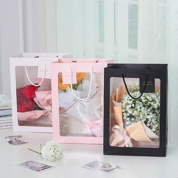 transparent window handbag small bouquet flower packaging hand bag gift wedding candy rose with wrap
transparent window handbag small bouquet flower packaging hand bag gift wedding candy rose with wrap