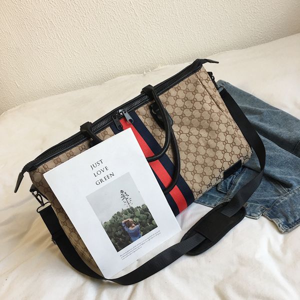new travel bag large capacity color stripe men's and women's business luggage portable single shoulder messenger bag purse outlet
new travel bag large capacity color stripe men's and women's business luggage portable single shoulder messenger bag purse outlet