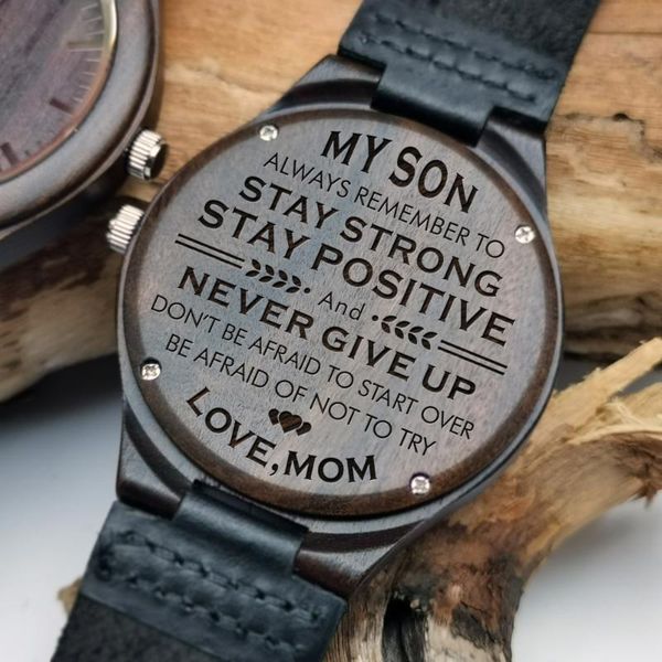 sculpted contents of the night light pointer wooden watch for son's graduation birthday present wristwatches, Slivery;brown 
sculpted contents of the night light pointer wooden watch for son's graduation birthday present wristwatches, Slivery;brown