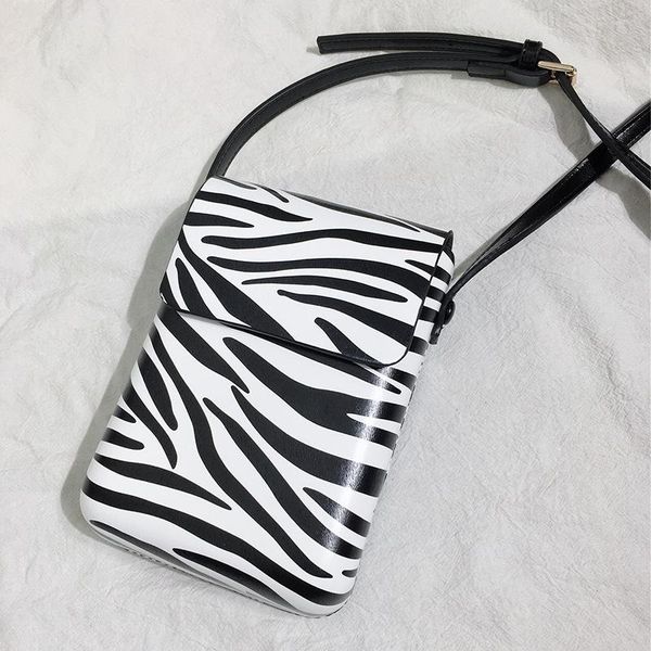 fashion zebra pattern flap cellphone bags women shoulder strap bag casual wild mini handbag ladies hard leather messenger cross body
fashion zebra pattern flap cellphone bags women shoulder strap bag casual wild mini handbag ladies hard leather messenger cross body