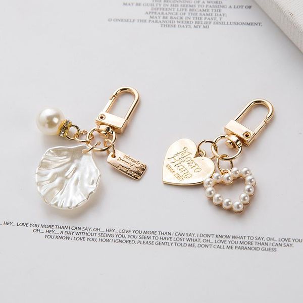 keychains 2021 creative metal letter keychain cute peach heart shell key ring birthday gift fashion car accessories, Silver
keychains 2021 creative metal letter keychain cute peach heart shell key ring birthday gift fashion car accessories, Silver