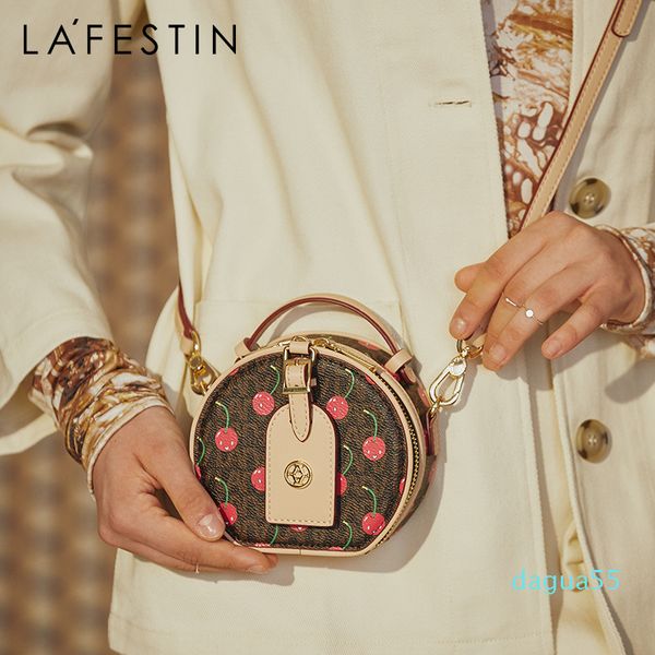 2020 new shoulder messenger female cherry round cake bag mini handbag small size q1118
2020 new shoulder messenger female cherry round cake bag mini handbag small size q1118