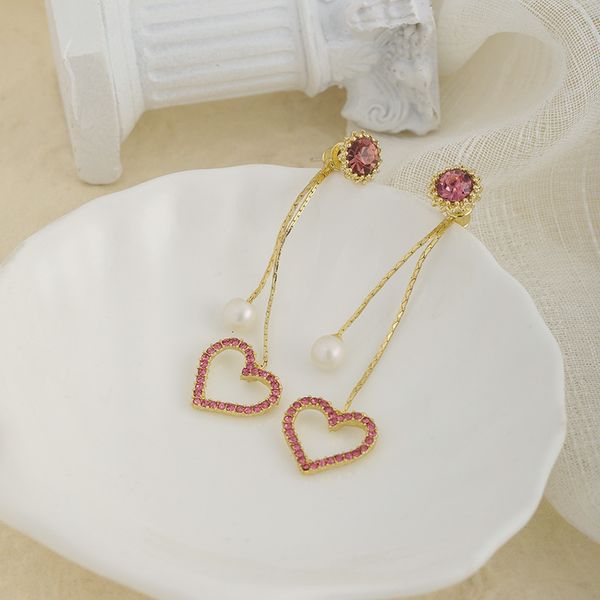 korean s925 silver needle long pearl love earrings female peach heart-shaped tassel temperament versatile
korean s925 silver needle long pearl love earrings female peach heart-shaped tassel temperament versatile