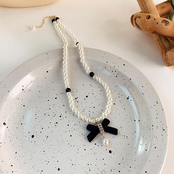pendant necklaces french pearl bowknot necklace sweet retro style korean clavicle chain female sweater fashionist, Silver
pendant necklaces french pearl bowknot necklace sweet retro style korean clavicle chain female sweater fashionist, Silver