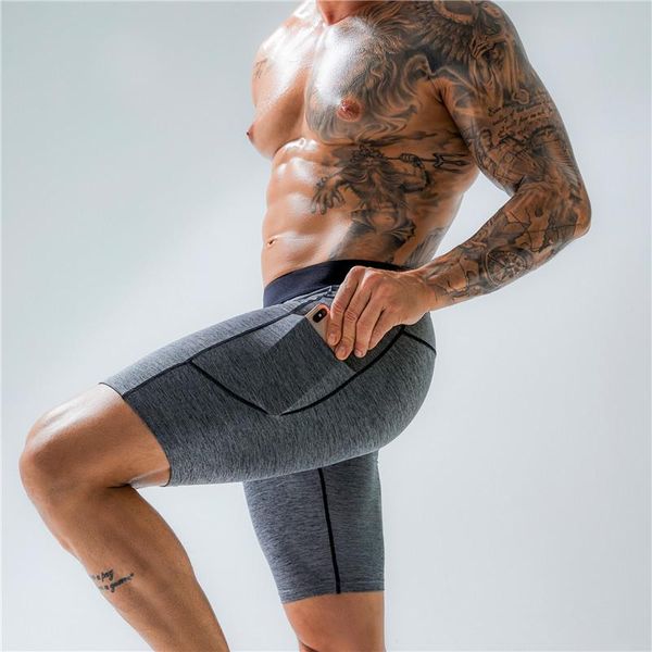 gym clothing men's fitness shorts with pockets sport running training wicking quick-drying stretch tight, White;black
gym clothing men's fitness shorts with pockets sport running training wicking quick-drying stretch tight, White;black