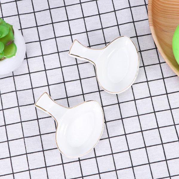 chopsticks 2 pcs lovely ceramic gold edge rack rest pillow spoon fork holder household el tableware seasoning sauce dish deco 
chopsticks 2 pcs lovely ceramic gold edge rack rest pillow spoon fork holder household el tableware seasoning sauce dish deco