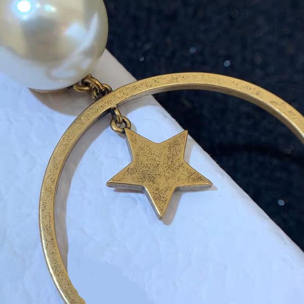 d rings stars, charm pearl earrings, women's european and american vintage earrings, high sense with box, Golden
d rings stars, charm pearl earrings, women's european and american vintage earrings, high sense with box, Golden