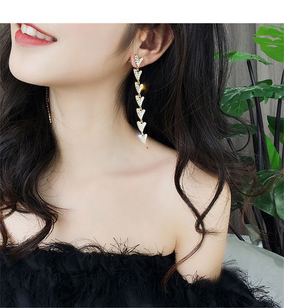 selling personality peach heart earrings fashion girl heart long section asymmetric tassel earrings shiny luxury earrings, Golden
selling personality peach heart earrings fashion girl heart long section asymmetric tassel earrings shiny luxury earrings, Golden