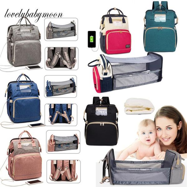diaper bags 2021 fashion portable folding crib bag multi-function large capacity baby backpack
diaper bags 2021 fashion portable folding crib bag multi-function large capacity baby backpack