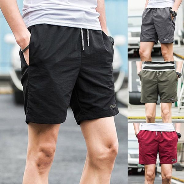 men's shorts beach quick dry board loose pants trouers summer fashion casual midwaist five-point, White;black
men's shorts beach quick dry board loose pants trouers summer fashion casual midwaist five-point, White;black