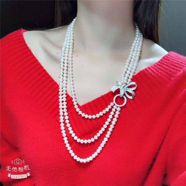 chains hand knotted 3strands 7-8mm white freshwater pearl necklace bowknot micro inlay zircon accessories pendant long 55-65 cm, Silver
chains hand knotted 3strands 7-8mm white freshwater pearl necklace bowknot micro inlay zircon accessories pendant long 55-65 cm, Silver