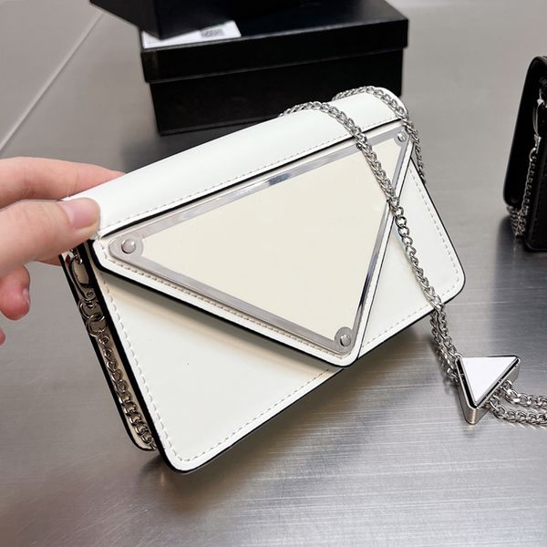 2021 winter women designer triangle mini shoulder bag italy milano brand triangular enamel logo flap handbags lady genuine leather crossbody
2021 winter women designer triangle mini shoulder bag italy milano brand triangular enamel logo flap handbags lady genuine leather crossbody