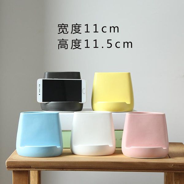 vases modern simplicity ceramic vase smartphone holder stand solid color office deskpen storage box
vases modern simplicity ceramic vase smartphone holder stand solid color office deskpen storage box