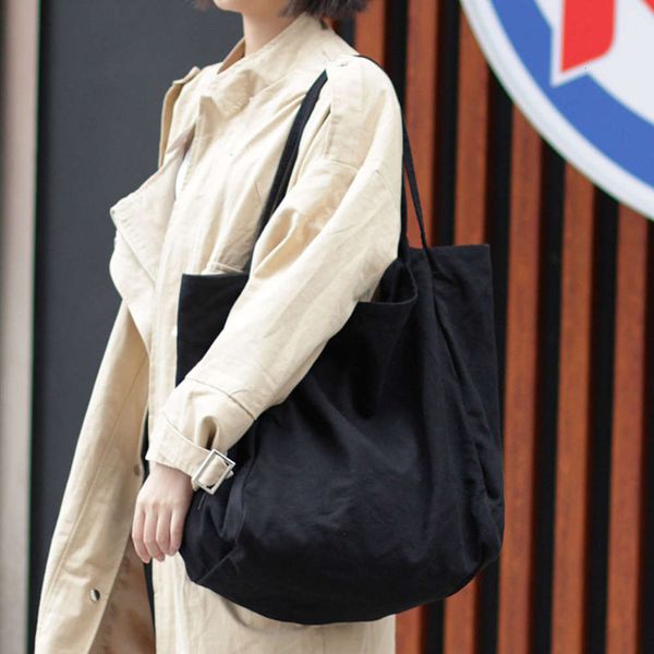 korean version of simple large-capacity wash canvas bag fashion mori literature and art shoulder casual handbag
korean version of simple large-capacity wash canvas bag fashion mori literature and art shoulder casual handbag