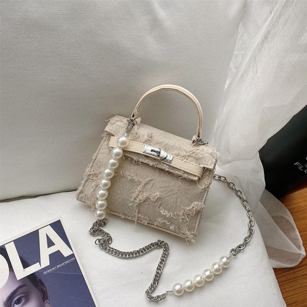 a group of hand-made denim stitching beggars' army cloth sailcloth small square handbags trendy women
a group of hand-made denim stitching beggars' army cloth sailcloth small square handbags trendy women