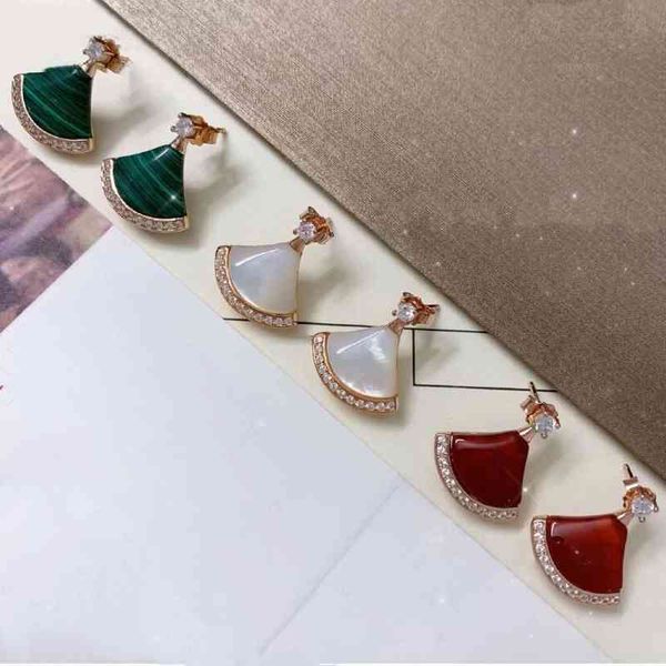the new baojia 925 sterling silver plated 18k gold short skirt earrings fan-shaped earrings, Golden
the new baojia 925 sterling silver plated 18k gold short skirt earrings fan-shaped earrings, Golden