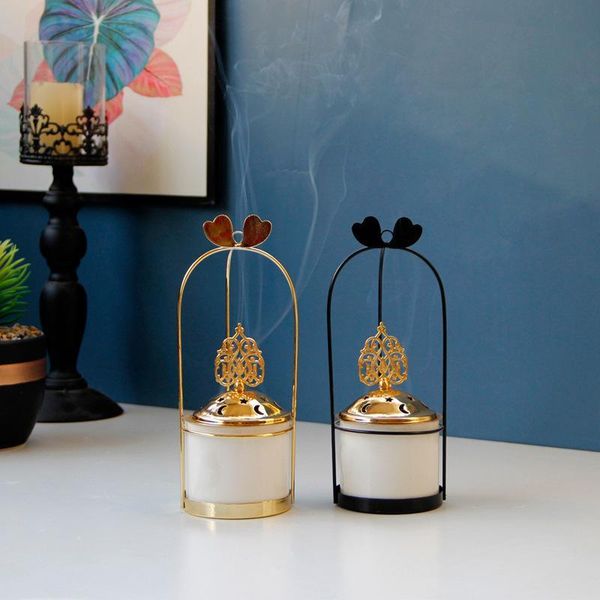 fragrance lamps simplicity ceramics incense holder creative hanging basket metal and ceramic burner with matel lid modern home decor
fragrance lamps simplicity ceramics incense holder creative hanging basket metal and ceramic burner with matel lid modern home decor
