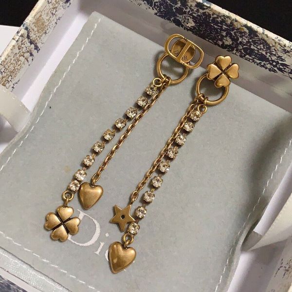 d family cd earrings temperament earrings star love long tassel letter asymmetric, Golden
d family cd earrings temperament earrings star love long tassel letter asymmetric, Golden