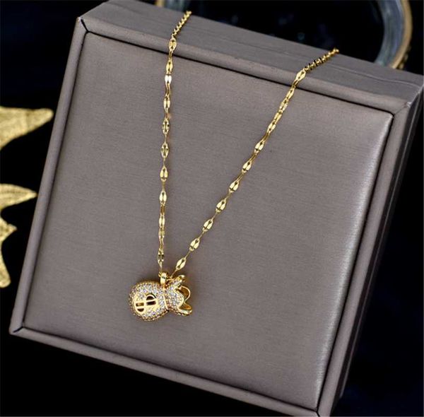 pendant necklaces 316l stainless steel gold inlaid crystal dollar purse without fading titanium ladies necklace, Silver
pendant necklaces 316l stainless steel gold inlaid crystal dollar purse without fading titanium ladies necklace, Silver
