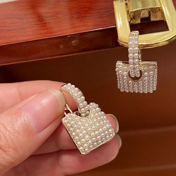 dangle & chandelier bilincolor trendy golden pearl square drop earring for women, Silver
dangle & chandelier bilincolor trendy golden pearl square drop earring for women, Silver