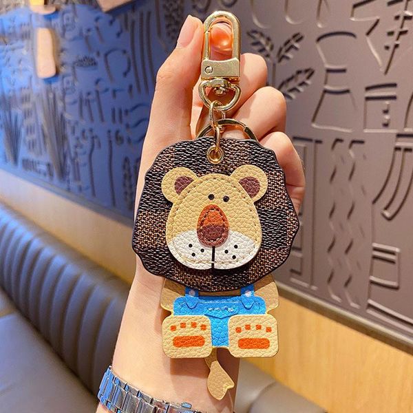 keychains luxury design cute leather lion keychain high shaking head backpack peadant fashion bag pendant accessories couple gift, Silver
keychains luxury design cute leather lion keychain high shaking head backpack peadant fashion bag pendant accessories couple gift, Silver