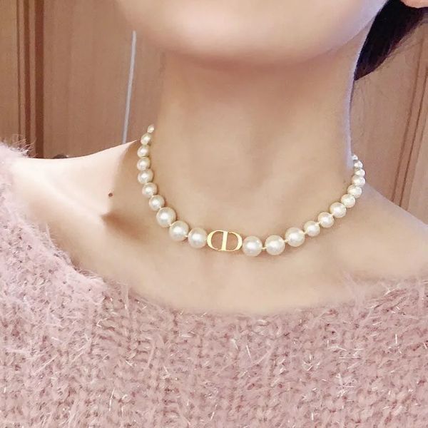 cd letter pearl necklace woman sterling silver net red pendant clavicle chain necklaces
cd letter pearl necklace woman sterling silver net red pendant clavicle chain necklaces